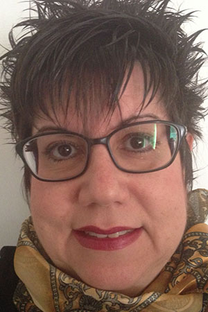A portrait of assistant clinical professor Valarie Artigas.
