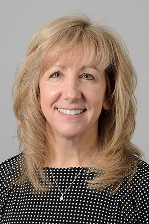 A portrait of staff member Kim Hearn.