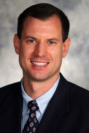 A portrait of associate professor Thomas Van Hoof.