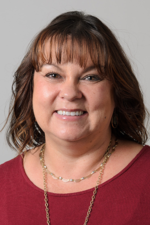 A portrait of staff member Karen Stevens.
